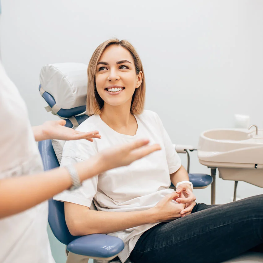 Friendly dentist and happy patient at dentistry in Torrance, 90503